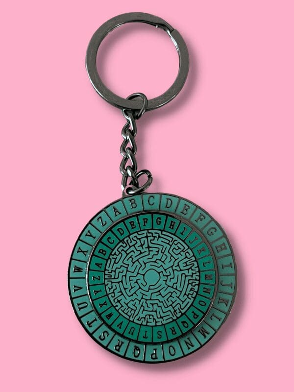 Enamel Keyring - Spinning Decipher Wheel
